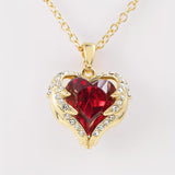 Collar corazón de rubí Angel Embrace | Oro