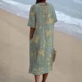 Evelina - Vestido Floral con un Encantador Cuello Peter Pan