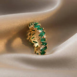Anillo de banda Bohemia con esmeralda