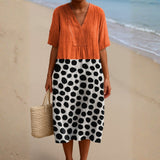 Penélope - Vestido Naranja con Puntos Contrastantes