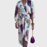 Elara Vestido Maxi con Escote en V Anudado y Estampado Sofisticado