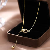 Collar de doble anillo chapado en oro