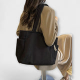 Tilda – Bolsa de transporte con detalle de cordón