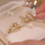 Anillos gemelos con diseño de aleteo elegante