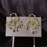 Pendientes creativos Estrella de Primavera con colgante