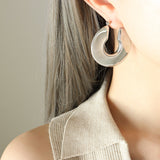 Pendientes de aro dorado Sol