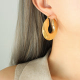Pendientes de aro dorado Sol