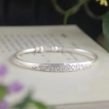 Pulsera de plata camino de flores