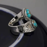 Elegante Anillo Vintage Cruzado de Turquesa