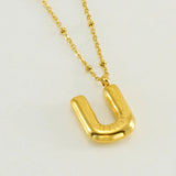 Collar especial de luz dorado de 18 quilates con esfera especial y letra inicial