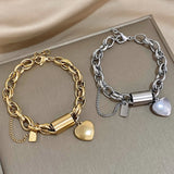 Pulsera gruesa Heartened | Oro blanco
