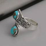 Elegante Anillo Vintage Cruzado de Turquesa