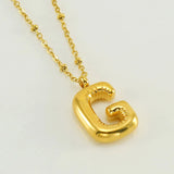 Collar especial de luz dorado de 18 quilates con esfera especial y letra inicial