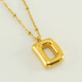 Collar especial de luz dorado de 18 quilates con esfera especial y letra inicial
