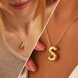 Collar especial de luz dorado de 18 quilates con esfera especial y letra inicial