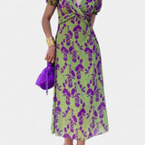 Elara Vestido Maxi con Nudo Frontal y Estampado Floral Delicado