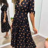 Amaris | Vestido Midi de Lunares con Escote en V para Mujeres