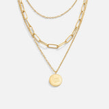 Collar estratificado con moneda