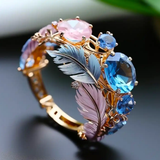 Anillo vintage de plumas exóticas de cristal