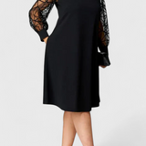 Bellezza Vestido Negro con Mangas de Malla y Corte Holgado