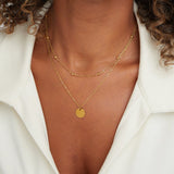 Collar de placas superpuestas