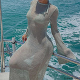 Salida de playa transparente sin espalda de manga larga